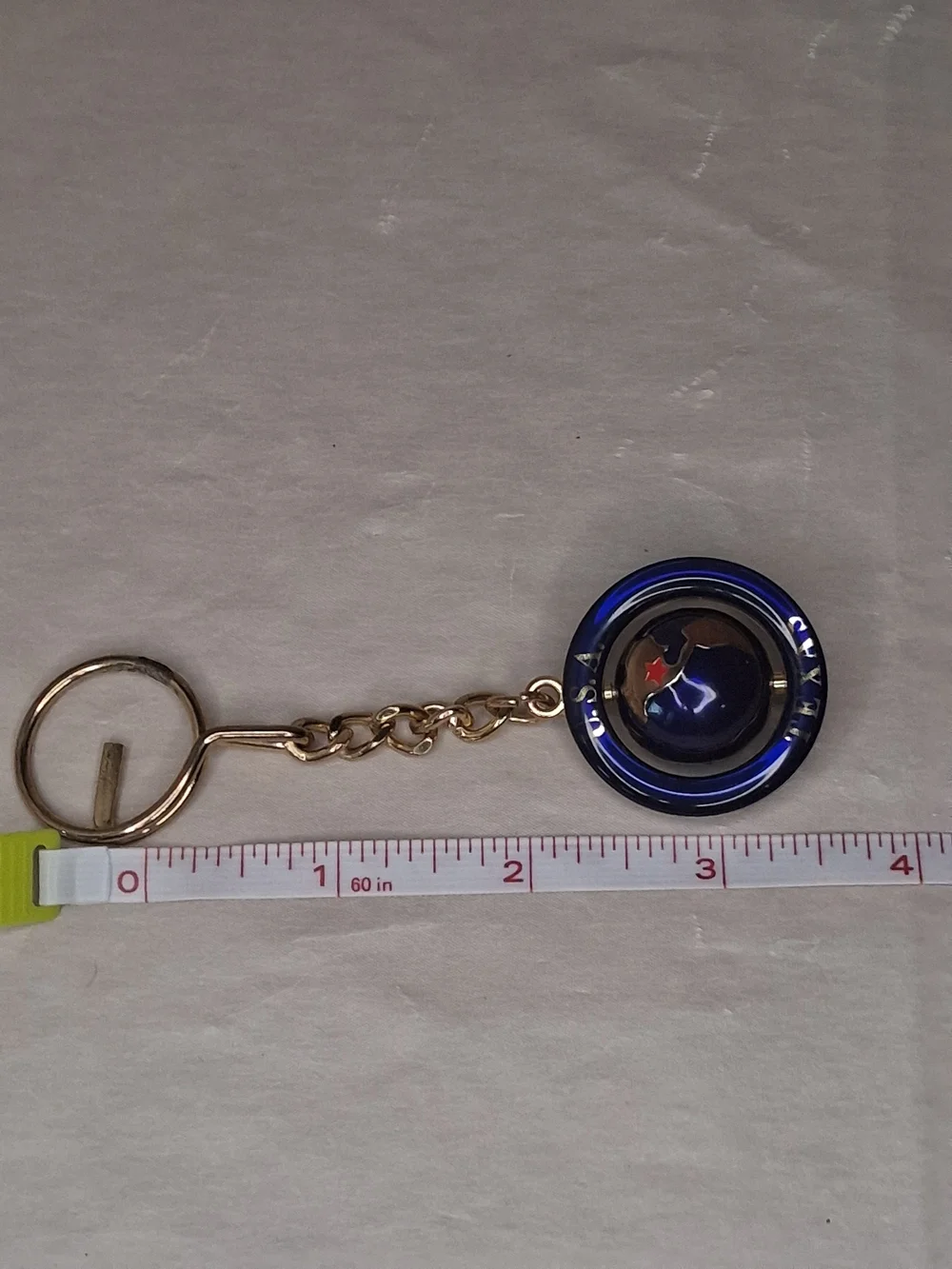 Gold Tone Keyring with Blue Enamel Round Charm